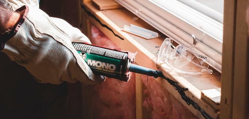 Applying Sealant on Window Frame